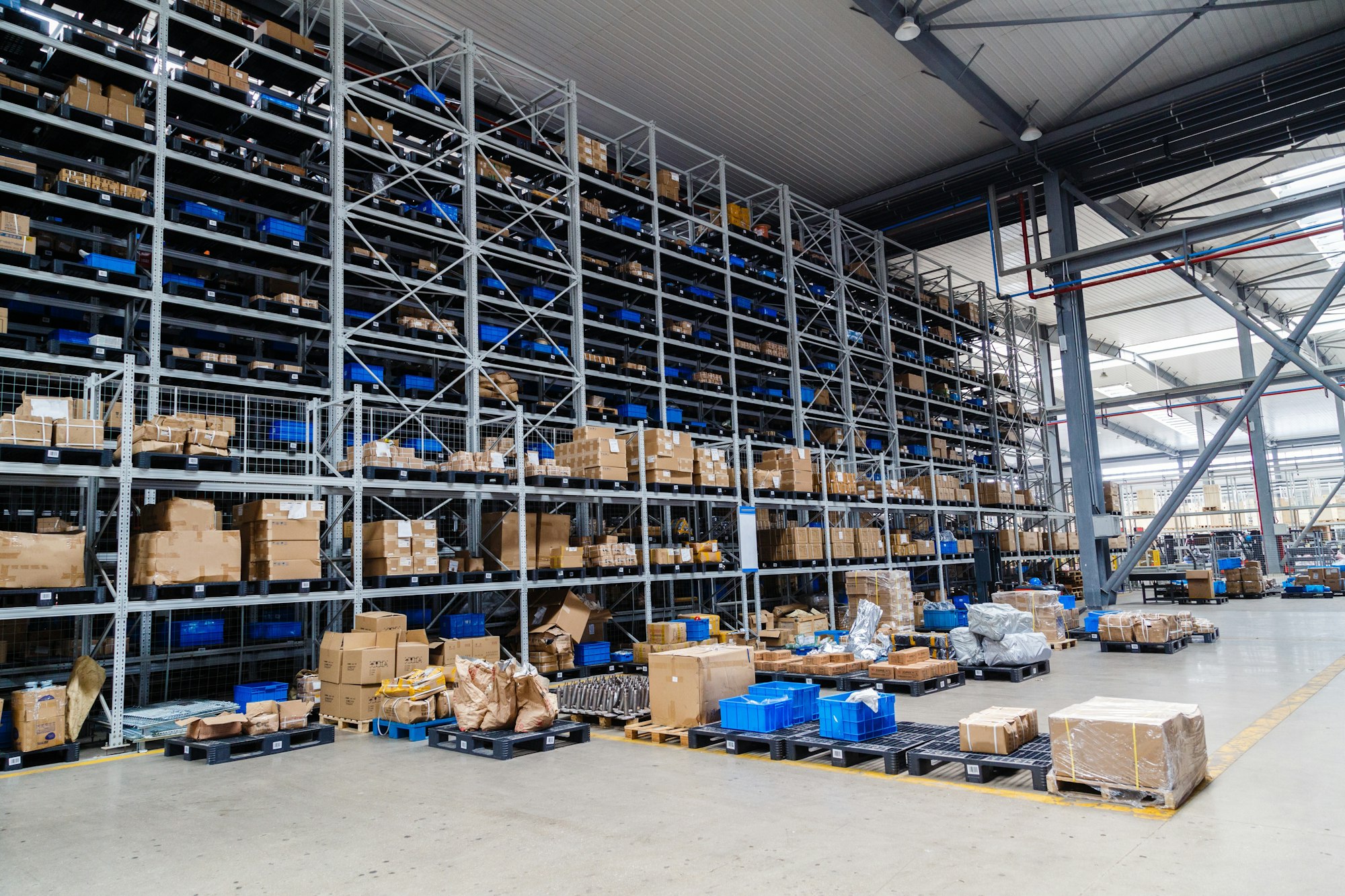 Modern big warehouse with large shelves of goods